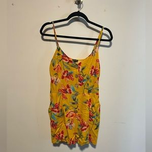 Yellow romper with flowers